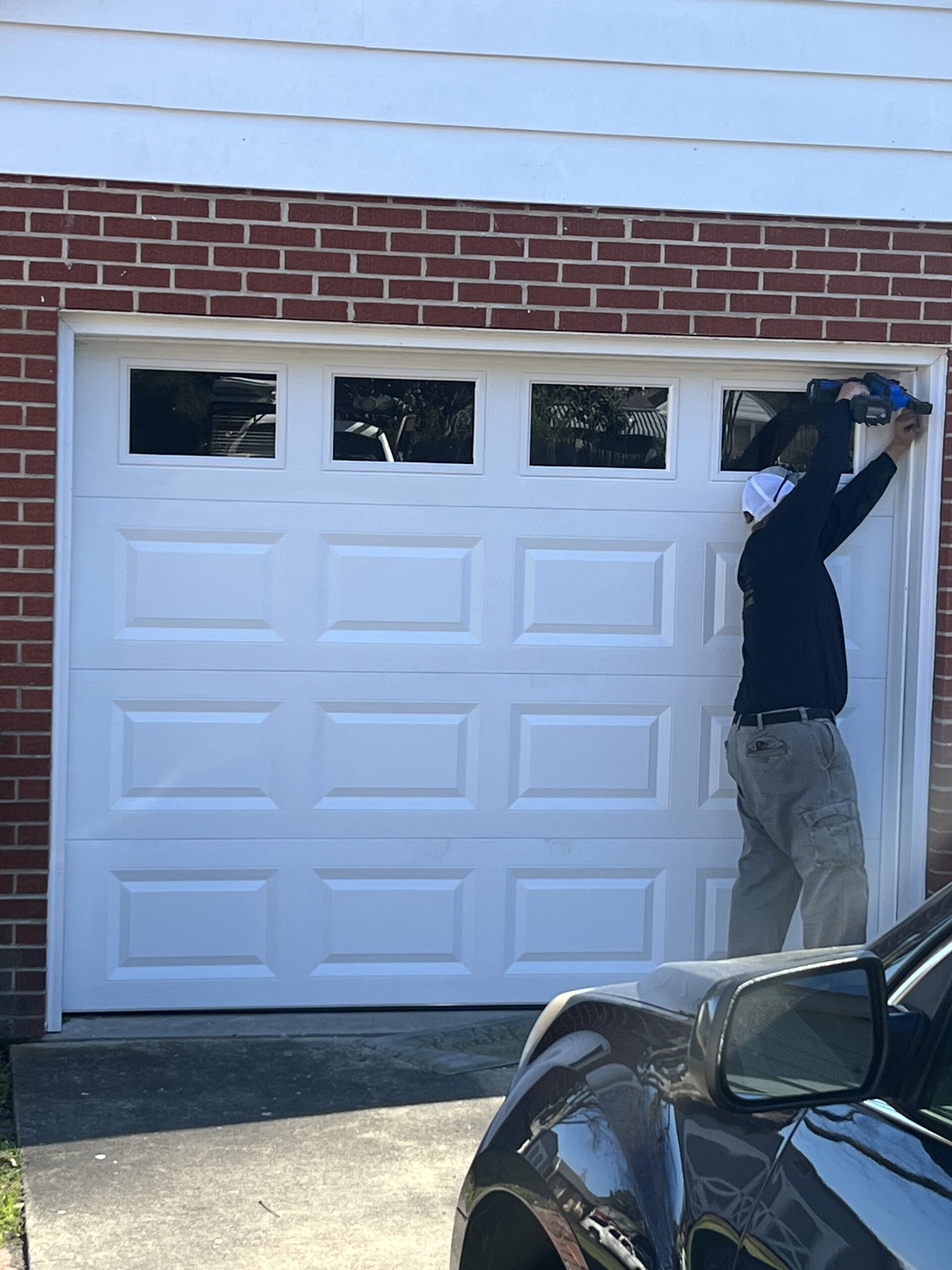 expert installing a garage door